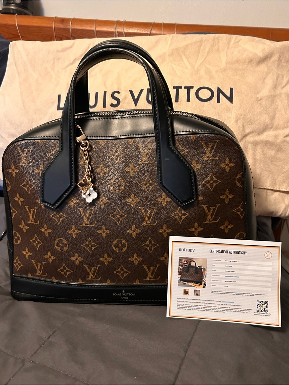 Louis Vuitton Brown Monogram Dora MM with Black Trim and Gold Charm
